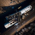 Passenger train crash accident, aerial view. Broken wagons and damaged locomotive Ai, generative