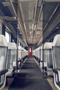 Passenger train interior with empty eats Royalty Free Stock Photo