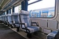 Passenger train interior with empty eats Royalty Free Stock Photo