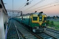 Passenger train over railway track - India Royalty Free Stock Photo
