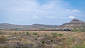 A passenger train is passing over a curve through a scenic section on Pune-Miraj railwayline Royalty Free Stock Photo