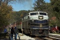 Passenger Train at railroad crossing. Royalty Free Stock Photo