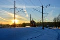 Passenger train on railway on sunset Royalty Free Stock Photo