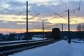 Passenger train on railway at sunset Royalty Free Stock Photo