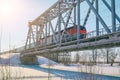 Passenger Train rides on the railway bridge Royalty Free Stock Photo