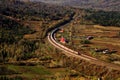 A passenger train running through the immense froest(II)