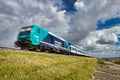 Passenger train speeding through countryside Motion blur