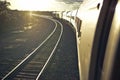 Passenger train traveling into the Arizona sunset Royalty Free Stock Photo