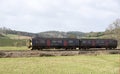 Passenger train travels south of Exeter in Devon UK Royalty Free Stock Photo