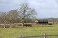 Passenger train travels south of Exeter in Devon UK Royalty Free Stock Photo