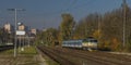 Passenger trains in station Kralovo Pole in Brno city in autumn color day