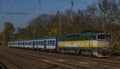 Passenger trains in station Kralovo Pole in Brno city in autumn color day