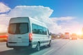 Passenger white bus van accelerating ride motion blur effect