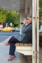 Passenger who Drinking and waiting car Royalty Free Stock Photo