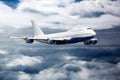 The passenger widebody plane flies high in the blue sky