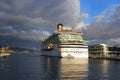 Passengers aboard the Costa Diadema cruise ship gather on deck for the departure from the port of Savona, Italy Royalty Free Stock Photo