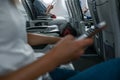 Passengers in abord a commercial flight using their cell phones