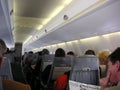 Passengers in Airplane cabin Royalty Free Stock Photo