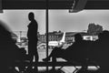 Passengers in the airport lounge are waiting for boarding a plane Royalty Free Stock Photo