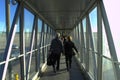 Passengers in airport walkway