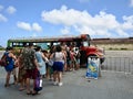 Passengers Boarding Free Shuttle Bus at the Cruise Ship Terminal in Oranjestad, Aruba Royalty Free Stock Photo