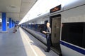 Passengers boarding highspeed train