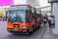 Passengers boarding a local 74 bus.