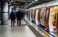 Passengers boarding London Underground train