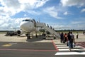 Passengers boarding a Plane Royalty Free Stock Photo