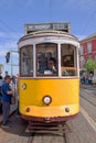 Passengers boarding the tram stop