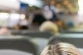 Passengers in the cabin. airplanes interior view. blurry Royalty Free Stock Photo