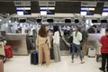 Passengers check in at the counter in departure gate of Suvarnabhumi Airport