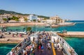 Passengers disembark from the ferry. Spetses, Saronic Gulf, Greece.