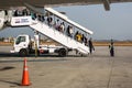 Passengers disembarking from a Qatar Airways flight at Tribhuvan International Airport.