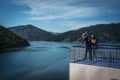 Passengers on ferry traveling from Wellington to Picton via Marlborough Sounds, New Zealand