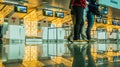 The passengers in front of check-in counter desk