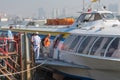 Passengers get on hydrofoil from Saigon to Vungtau Royalty Free Stock Photo