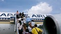 Passengers going up the plane