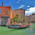 Passengers on gondola in Venice, Italy Royalty Free Stock Photo