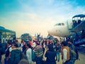 Passengers of Indigo Airlines get on the shuttle bus in Delhi Airport