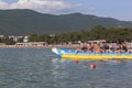 Passengers inflatable banana ready for the water rides. Beach activities the resort city of Gelendzhik Royalty Free Stock Photo