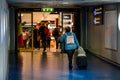 Passengers inside Henri Coanda International Airport, near Bucharest, Romania Royalty Free Stock Photo