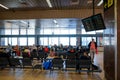 Passengers inside Henri Coanda International Airport, near Bucharest, Romania Royalty Free Stock Photo