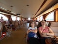 Passengers inside a Pearl river public boat, Guangzhou, China
