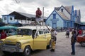 Passengers loading a collectible taxi in Cuba