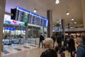 Passengers look at the arrival and departure boards at the airport