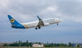 Passengers plane Boeing 737-900ER on the Boryspil airport apron runway. Ukraine International Airlines planes.