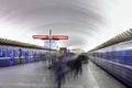 Passengers are on platform at underground station in Russian s