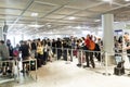 Passengers queue in the departure hall in the Frankfurt airport Royalty Free Stock Photo