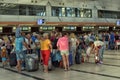 Passengers queue to check in at the airport Royalty Free Stock Photo